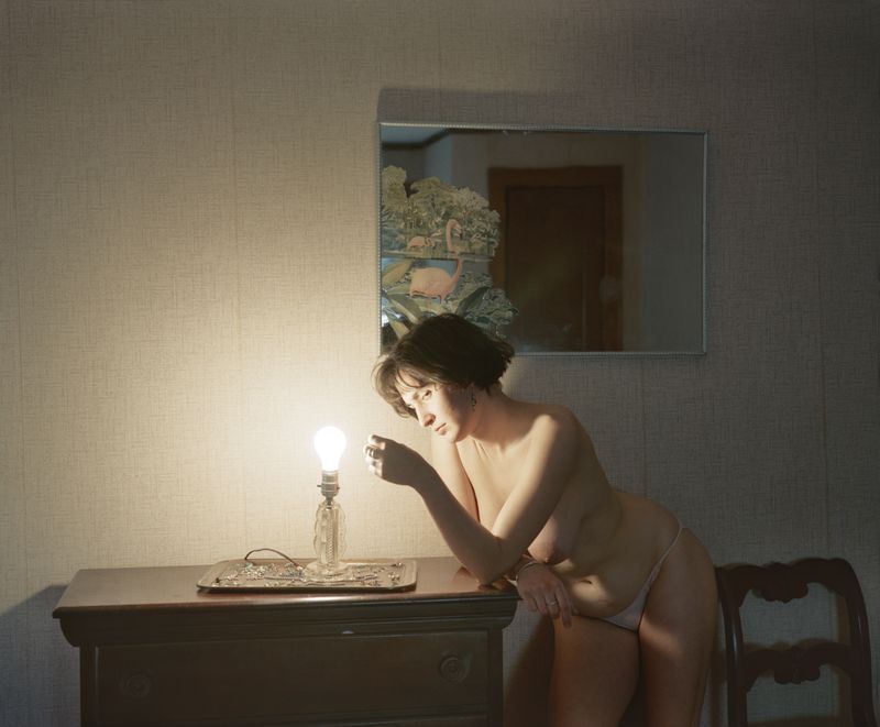 © Jo Ann Walters - 07_Gabriell w jewelry and bare light bulb, from the series Vanity + Consolations, 1988-present
