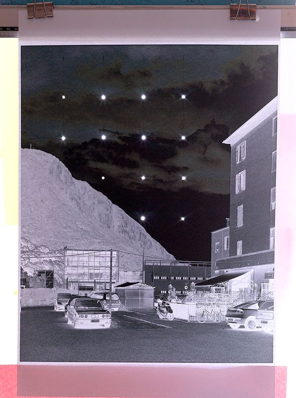 © Jens Masmann - "Stars in the sky (possibly indicating nighttime), snow hills with lights (suggesting winter season)"