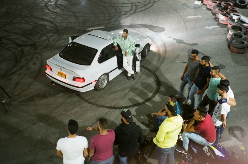 © Melissa COLLETT - Ihab and the boys posing for a picture whilst drifting