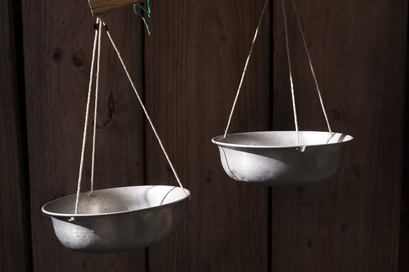 © Cris Veit - Scales used to weight fish and other produce at the street market in San Pedro la Laguna