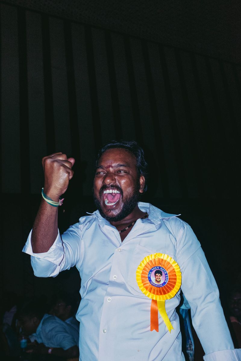 © Balaji Maheshwar - Fans in a state of euphoria inside the cinema hall during a release of a film