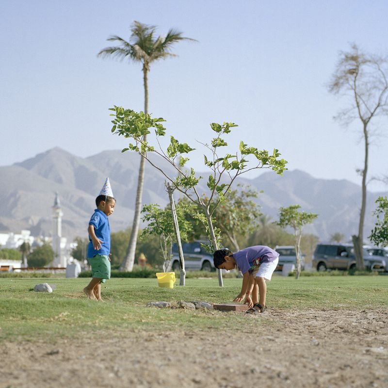 © Josh Adam Jones - Children playing on Shatti Beach. Muscat, Oman.