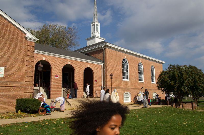 © Hilina Abebe - Members of the Ethiopian community after a Sunday mass at the Holy Trinity Ethiopian Orthodox Church in Falls Church, VA.