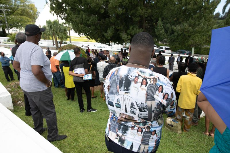 © Jayde Gibbons - The grandaughter of Charles Thomas wearing a memorial T-shirt.