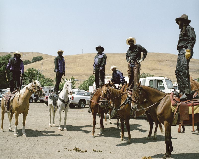 © Gabriela Hasbun - The Brotherhood Riders Group from Stockton pose for a picture at the BPIR Oakland in 2008.