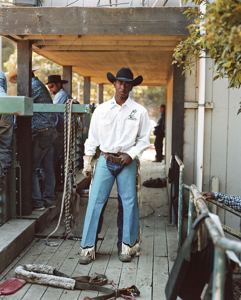 © Gabriela Hasbun - Cowboy Jamir Graham nervously awaits his turn to compete at the 32nd annual Bill Pickett rodeo in 2017. Oakland, CA.