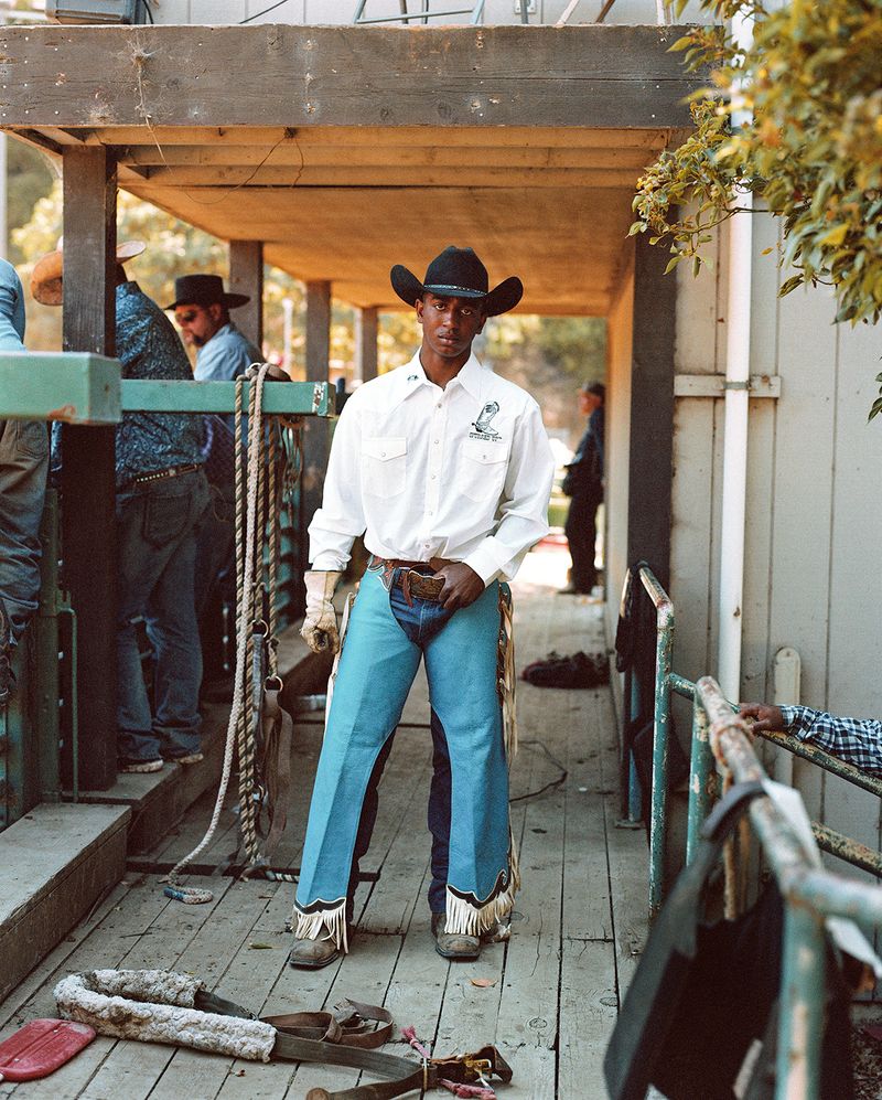 © Gabriela Hasbun - Cowboy Jamir Graham nervously awaits his turn to compete at the 32nd annual Bill Pickett rodeo in 2017. Oakland, CA.