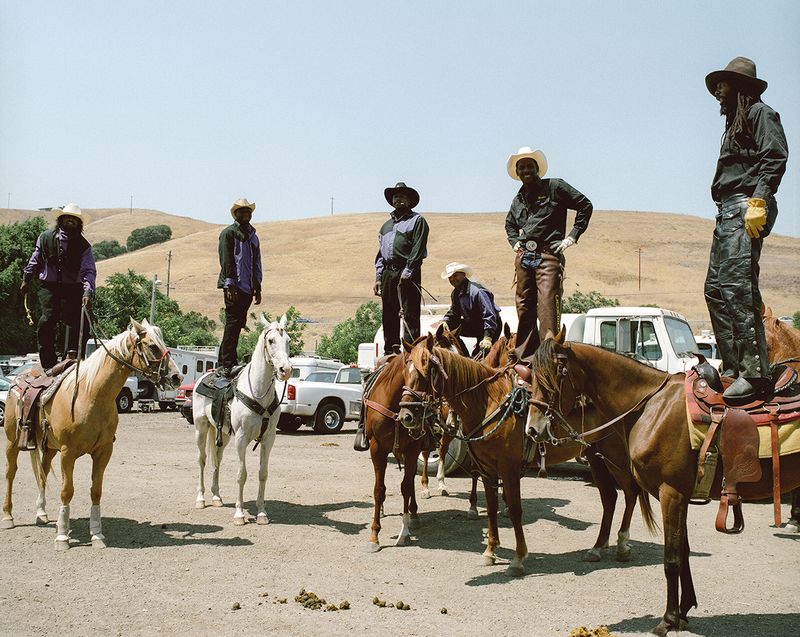 © Gabriela Hasbun - The Brotherhood Riders Group from Stockton pose for a picture at the BPIR Oakland in 2008.