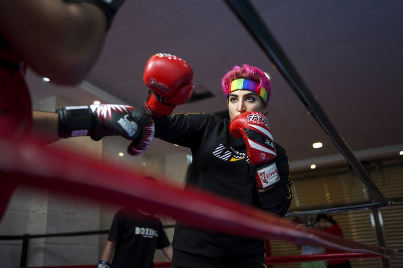 © Ali Rad - Hanieh is training in the boxing ring.