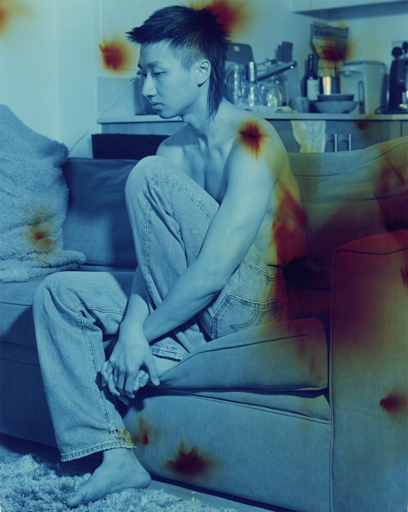 © Bowei Yang - Tommy sitting in his room, color darkroom print, 2020.