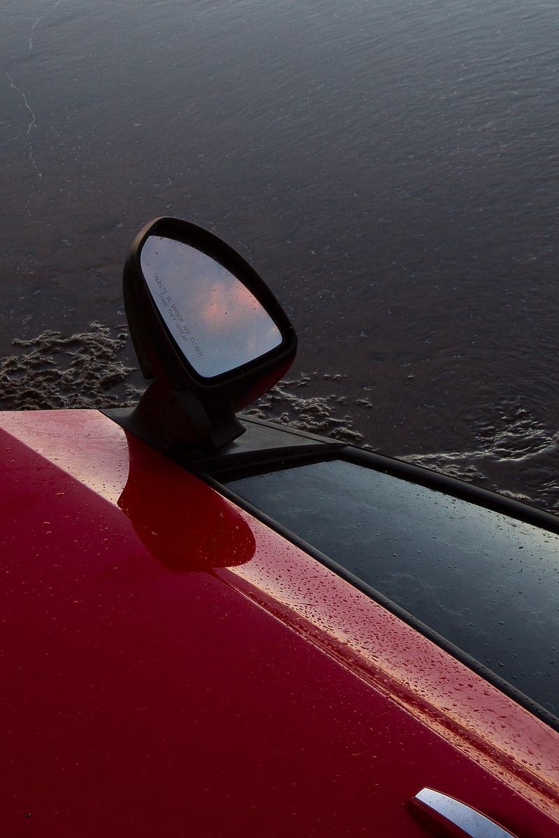 © Sophie Dumaresq - text reads "objects in mirror are closer than they appear"