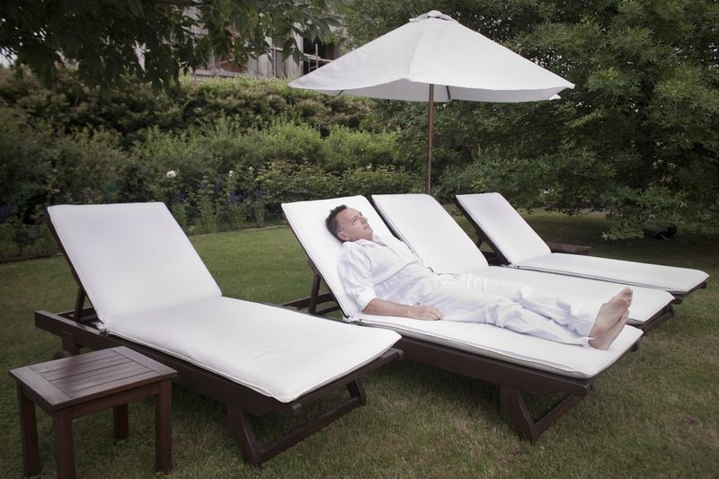 © Cooperativa Sub - Horacio, the father, relaxes in his garden.