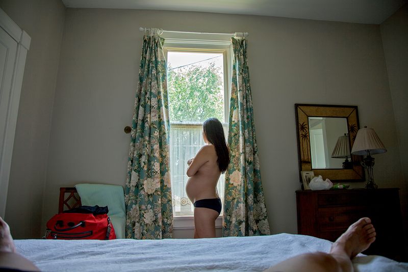 © Arin Yoon - Self-portrait at a B&B in between duty stations, Leavenworth, KS, 2014.