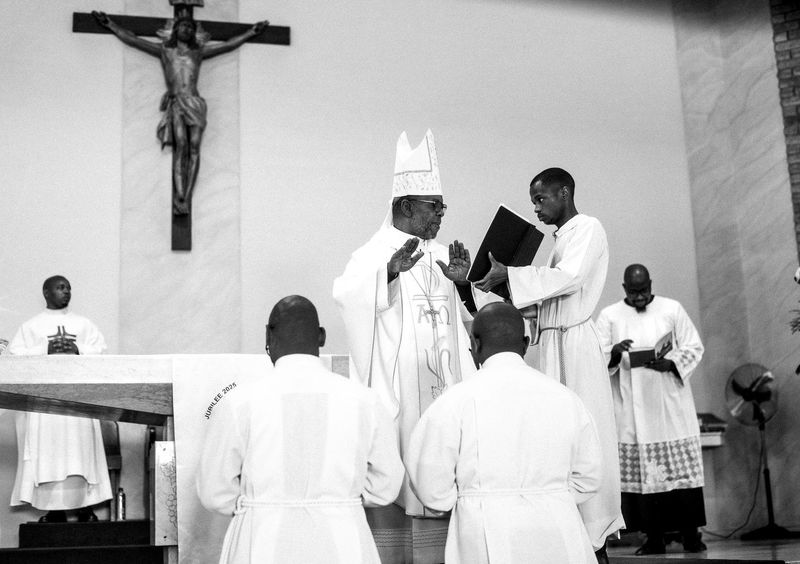 © Cole Ndelu - The laying of the hands - the gesture signifies the bestowal of God’s grace