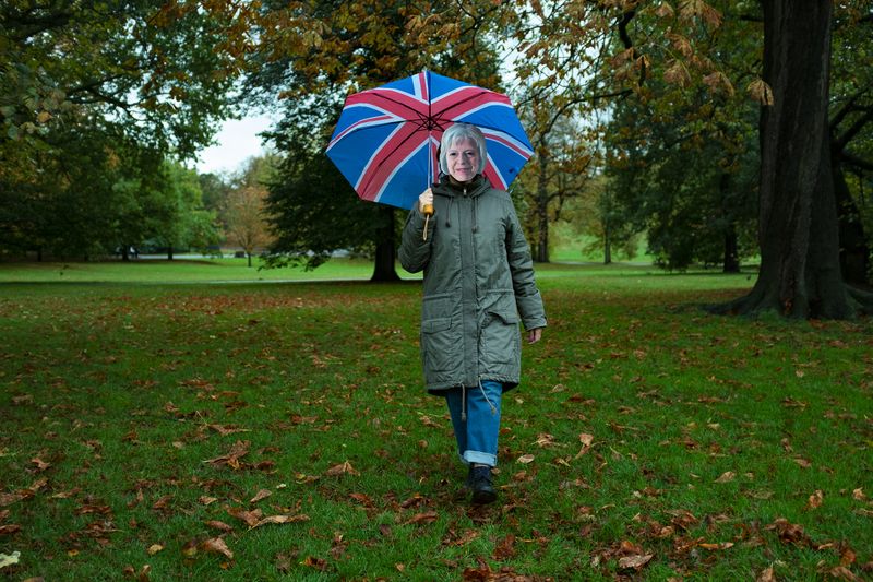 © Michela Carmazzi - "I wish I were Theresa in the park" Self-portrait wearing a cardboard mask of Theresa May.
