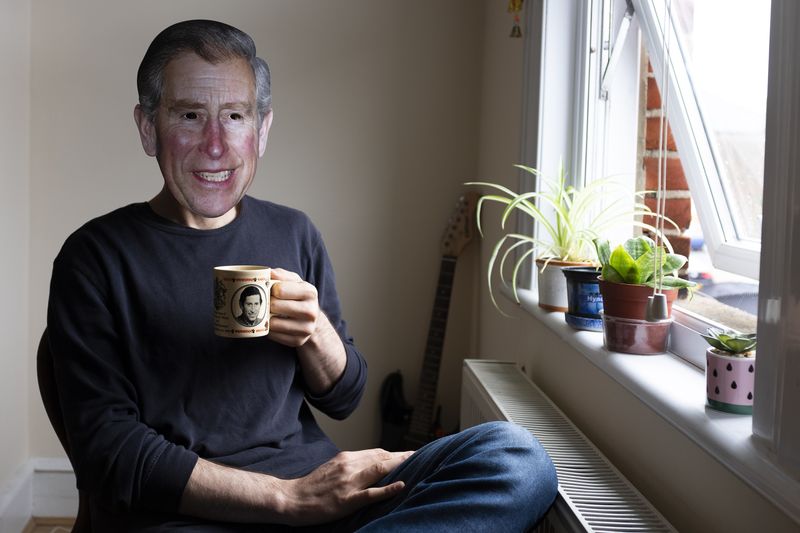 © Michela Carmazzi - "I wish you were Charles" Portrait of my partner wearing a cardboard mask of Prince Charles.