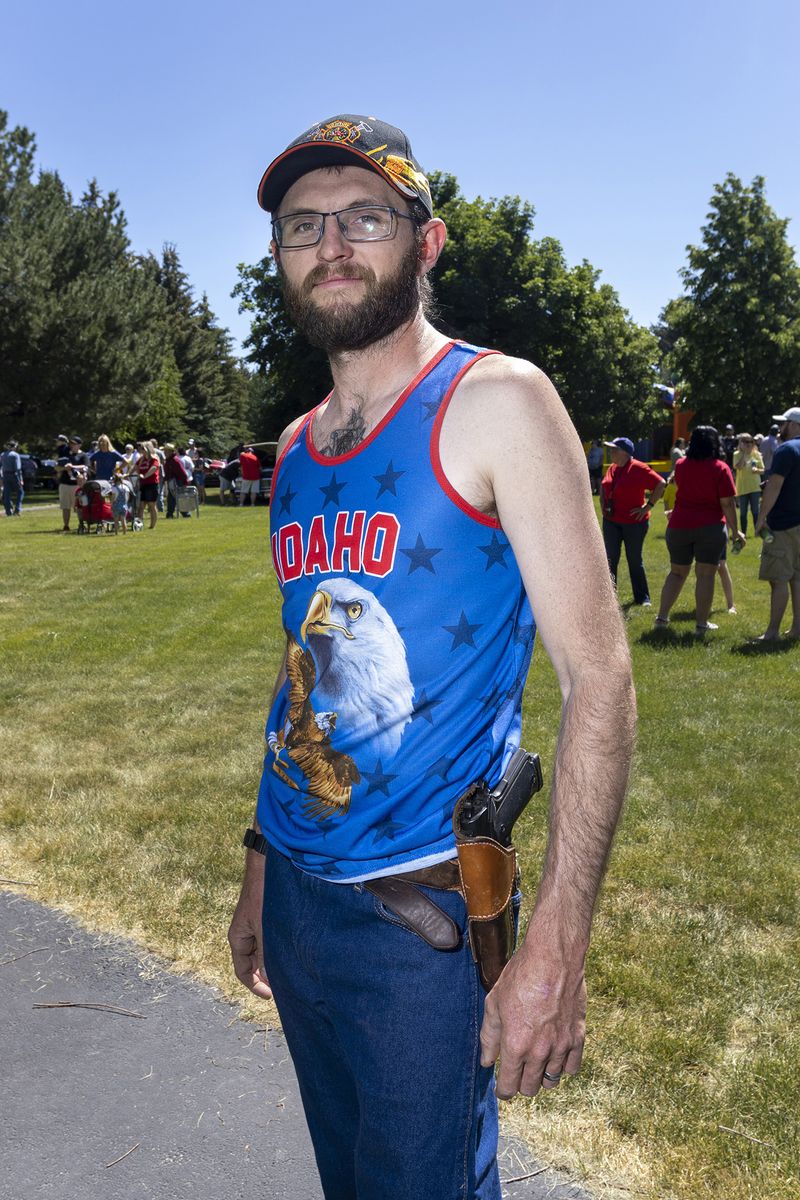 © Natalie Behring - Colby Peterson in a park in Ashton, Idaho. He is carrying a gun.