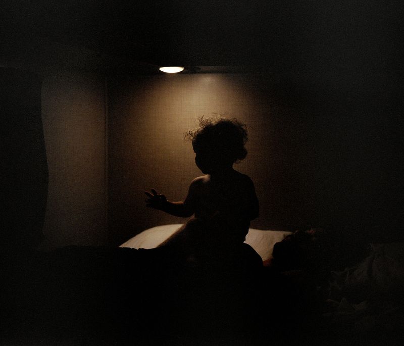 © Berber Theunissen - Please can you put her on my lap, I haven’t been able to hold her for two weeks.