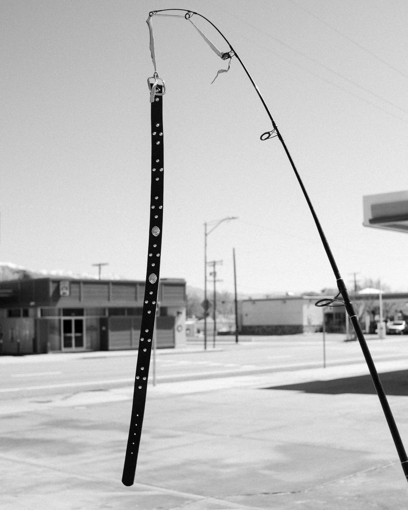 © Phoenix Kanada - Untitled (Flag & Fishing Rod)