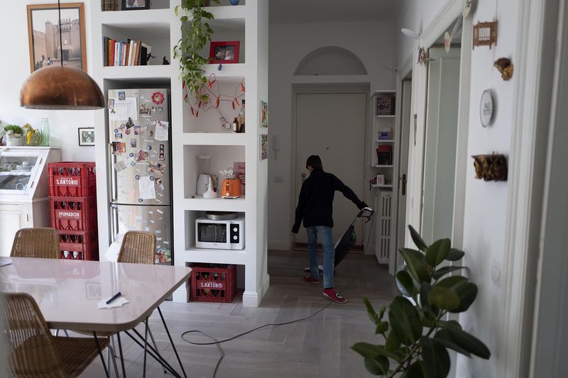 © Paolo Bona - Milan, March 15, 2020My son Mario helps on houseworks.