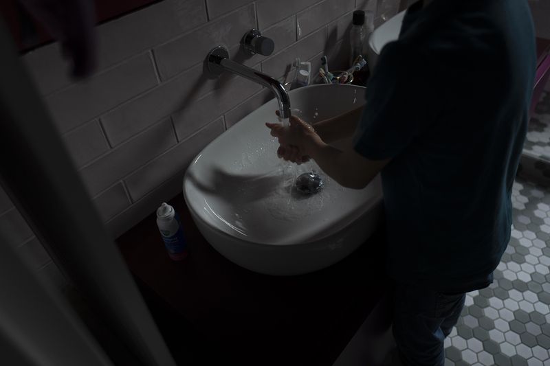 © Paolo Bona - Milan, March 22, 2020My 10-year-old son Mario washes his hands.
