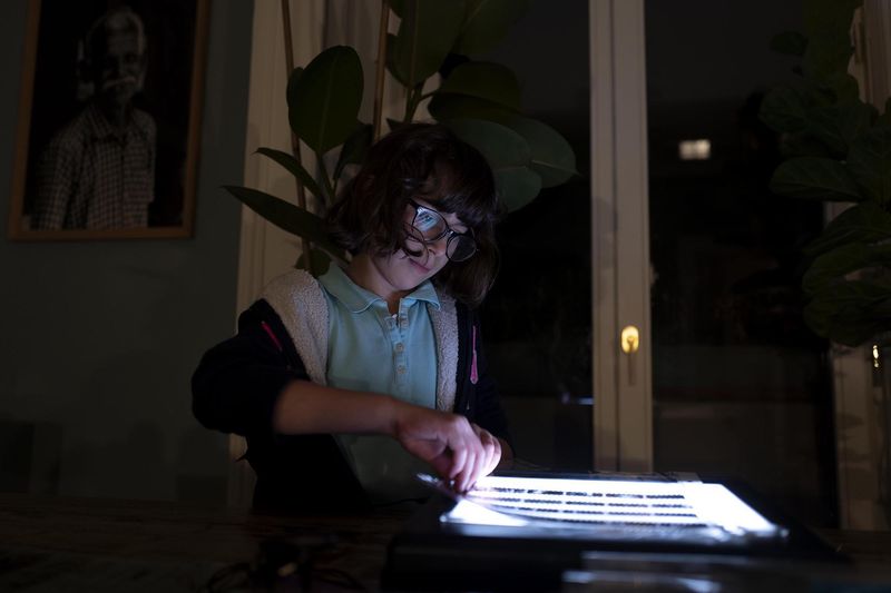 © Paolo Bona - Milan, March 30, 2020My daugheter Margherita helps me tidy up my analogue archive.