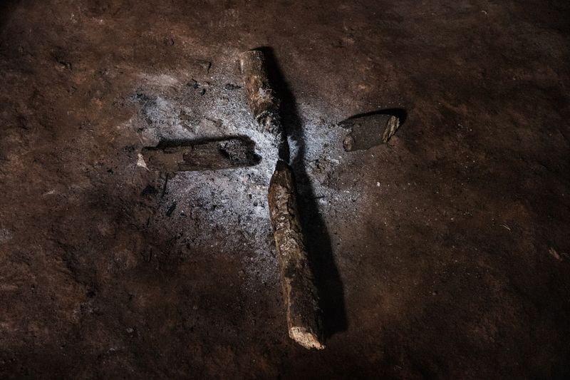 © Rafael Vilela - São Paulo, Brazil. December 12, 2024. Remains of a fire are found inside the Guarani prayer house in the Pyau village.