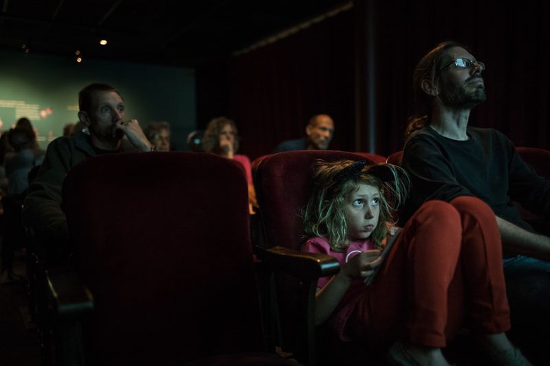 © Fulvio Bugani - Adi at the cinema - Adi and her father watching a documentary about Cuba