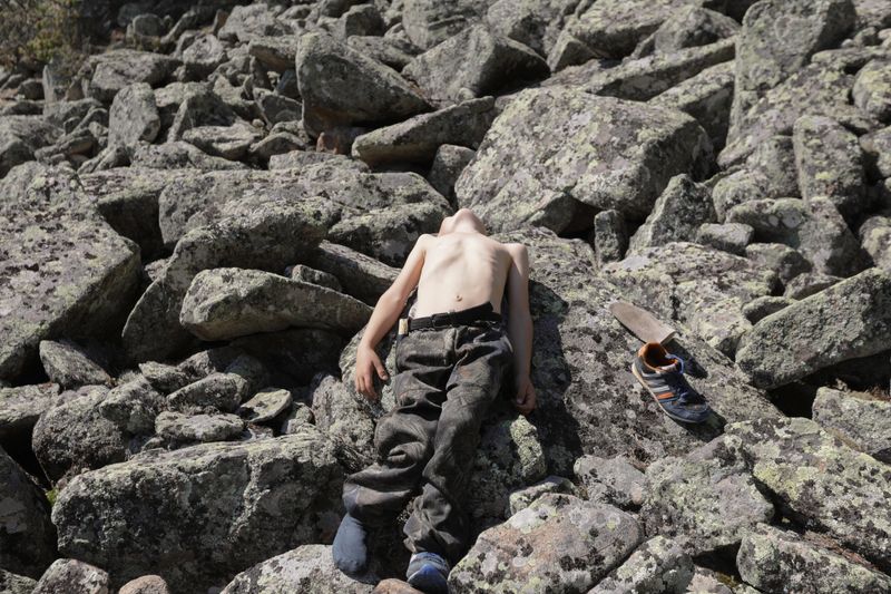 © NADEZHDA ARESHINA - Grigory is on the top of the mountain Baldy. Kuyacha village, Altay region, Russian Federation, 2021.