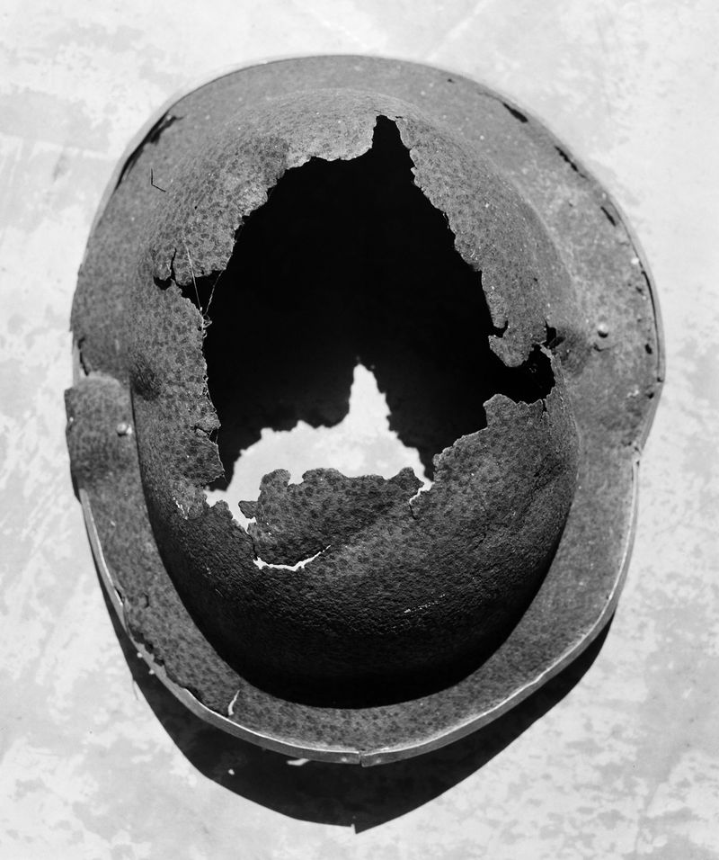 © Kent Andreasen - A rusted out helmet found on the island from the occupation of Italian and German forces during The Second World War.