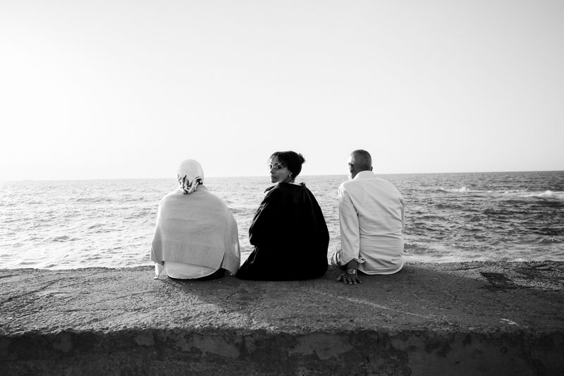 © Nayra Aly - My mother Laila, myself and my father Ramadan, enjoying the sunset together before my return to Sweden.