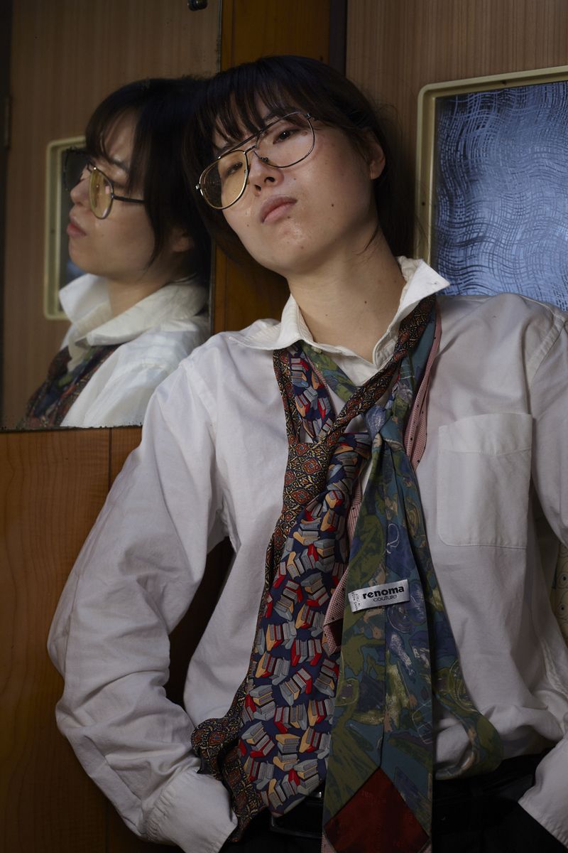 © Yuki Furusawa - Daughter wearing her father’s ties and glasses.