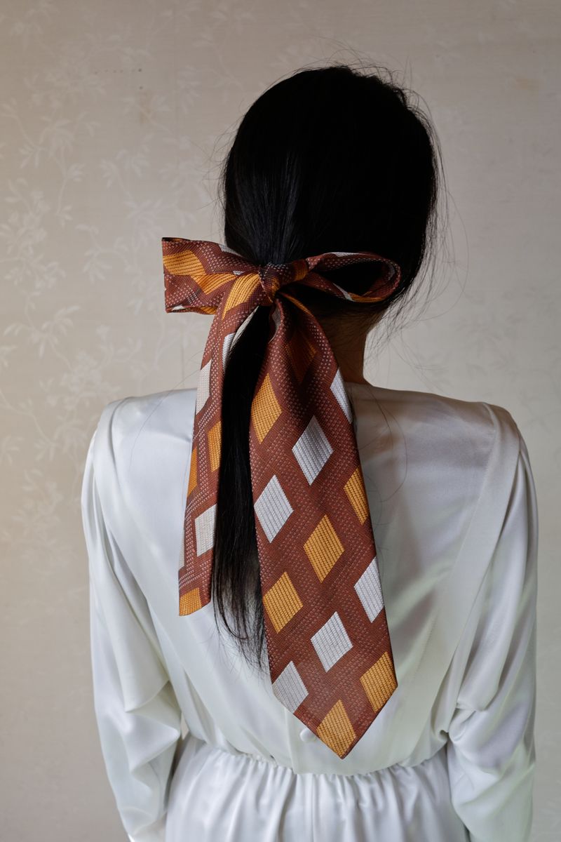 © Yuki Furusawa - A portrait of me wearing my grandmother's dress and tying my hair with my grandfather's tile in the house.