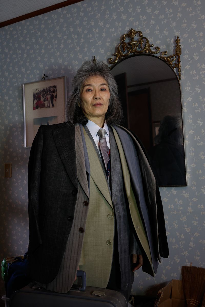 © Yuki Furusawa - A portrait of my mother wearing her father’s old suit jackets from over 30 years ago.