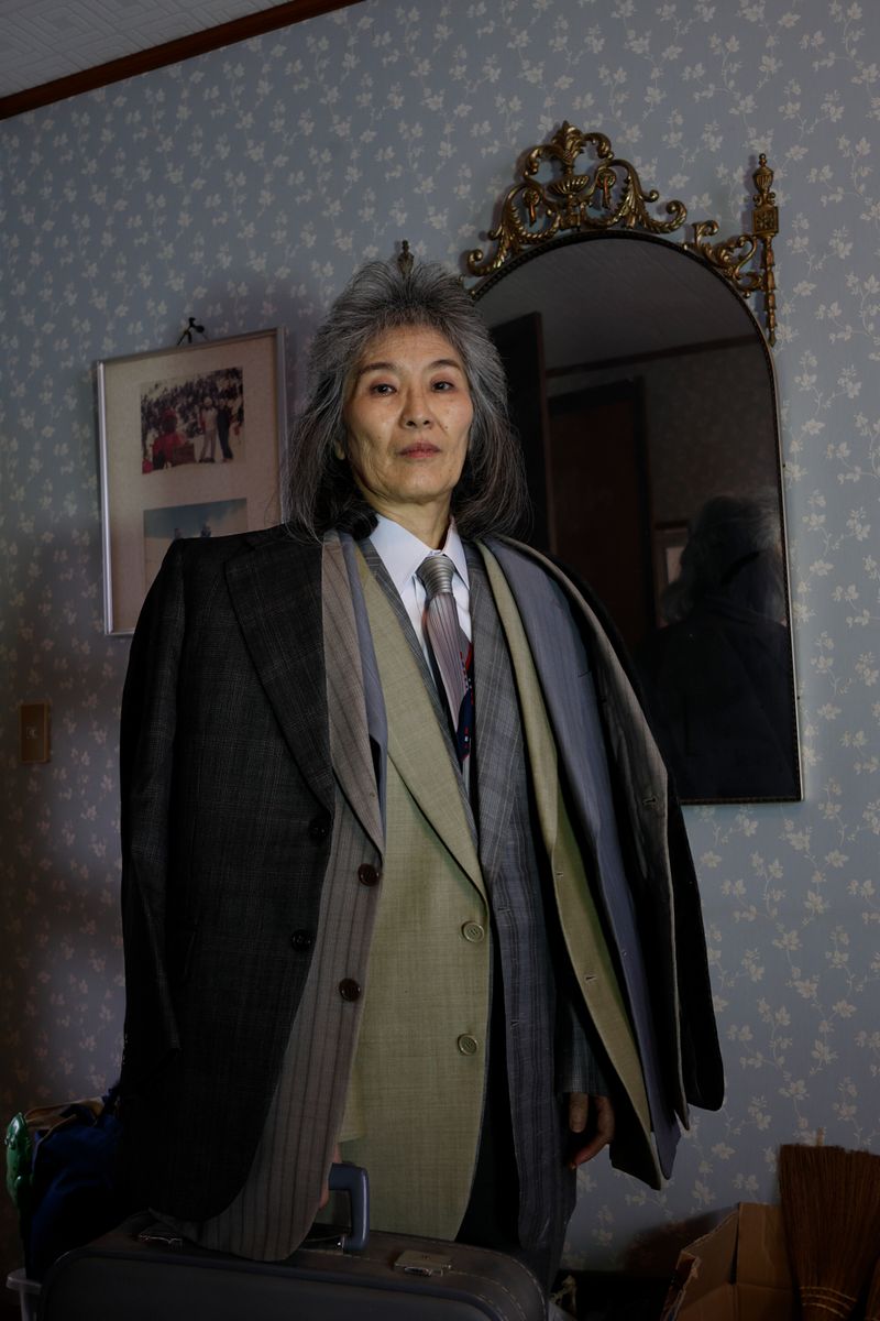 © Yuki Furusawa - A portrait of my mother wearing her father’s old suit jackets from over 30 years ago.