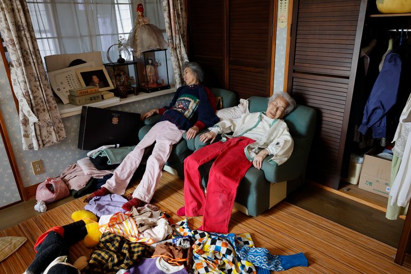 © Yuki Furusawa - My grandmother and mother taking a nap while clearing out a lot of old clothes.