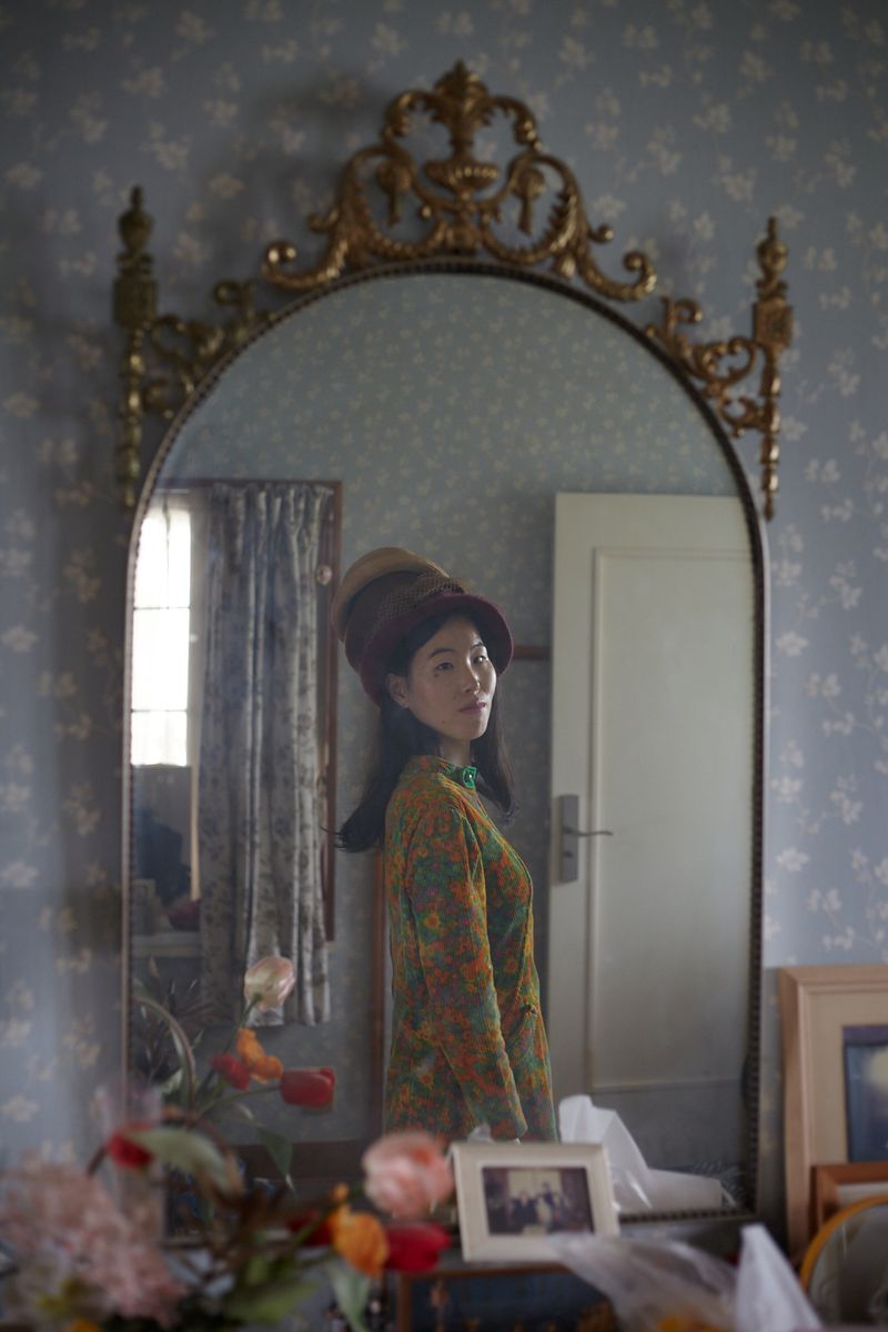 © Yuki Furusawa - Me looking into my grandma’s mirror, wearing her favorite outfit from her youth.
