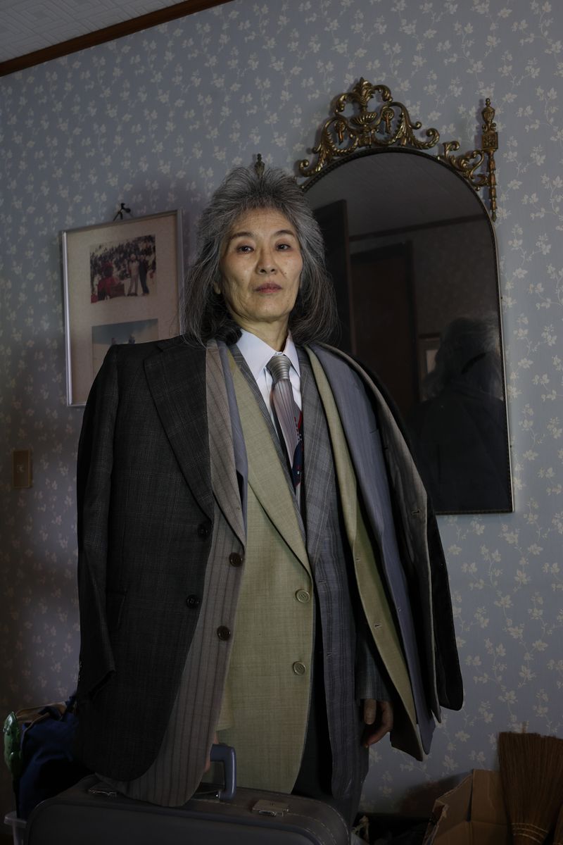 © Yuki Furusawa - A portrait of my mother wearing her father’s old suit jackets from over 30 years ago.