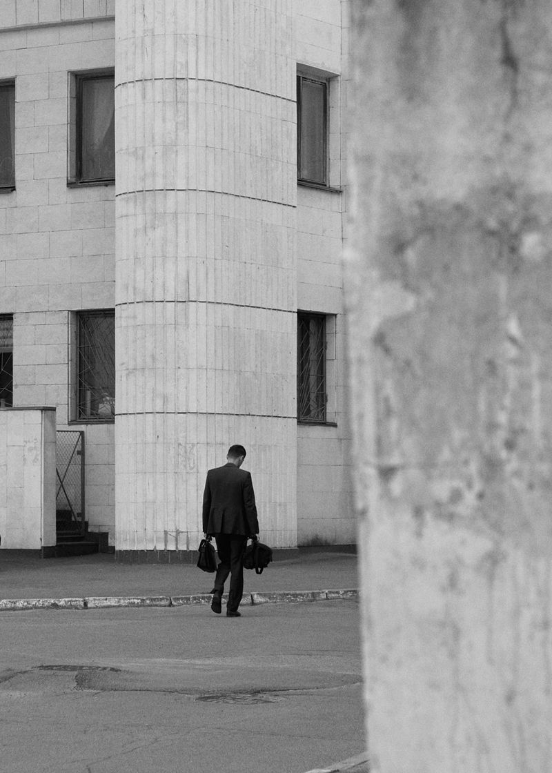 © Pernille Sandberg - A man walking by the Vernadsky National Library of Ukraine.