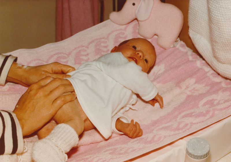 © Julia Mejnertsen - My mother with baby and elephant teddy - family archival photograph
