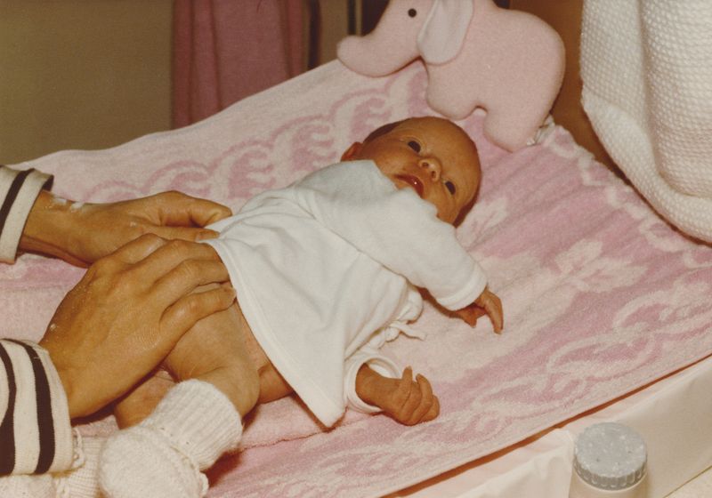 © Julia Mejnertsen - My mother with baby and elephant teddy - family archival photograph