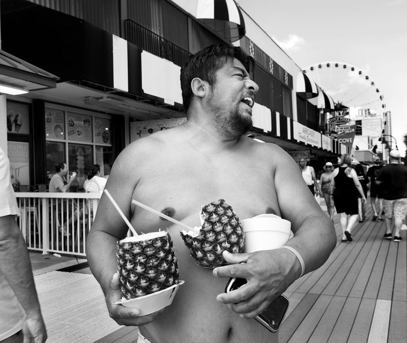 © Mary-Louise Miller - Pineapple Man.  Tourist on the Myrtle Beach boardwalk.        © ML Miller