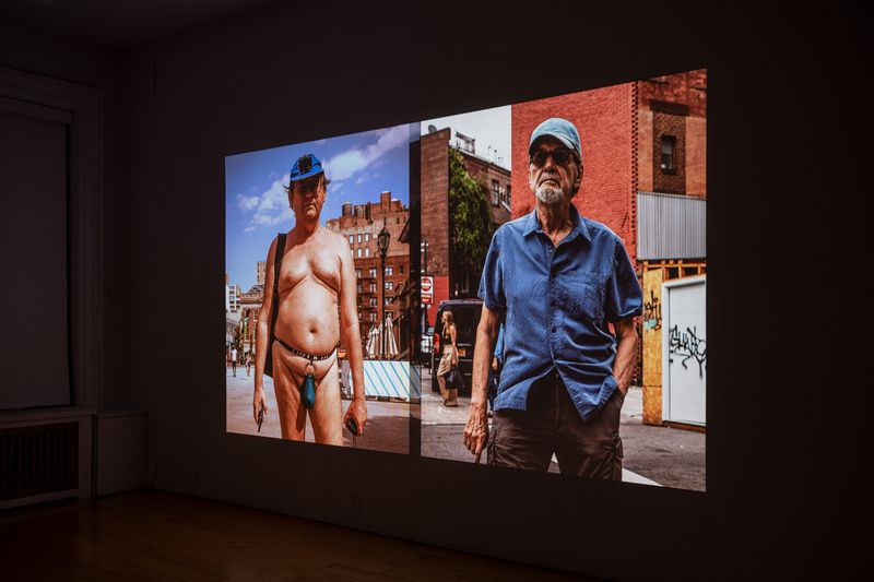 © Vytenis Jankūnas - Gallery installation view of "800 Portraits of the People I Don't Know - Part 2" Video Projection.