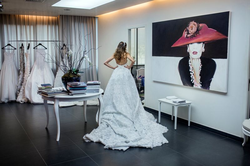 © Anna Bosch - Yoanna, fitting her wedding dress in Rani Zakhem designer studio