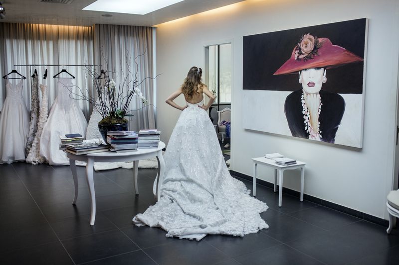© Anna Bosch - Yoanna, fitting her wedding dress in Rani Zakhem designer studio