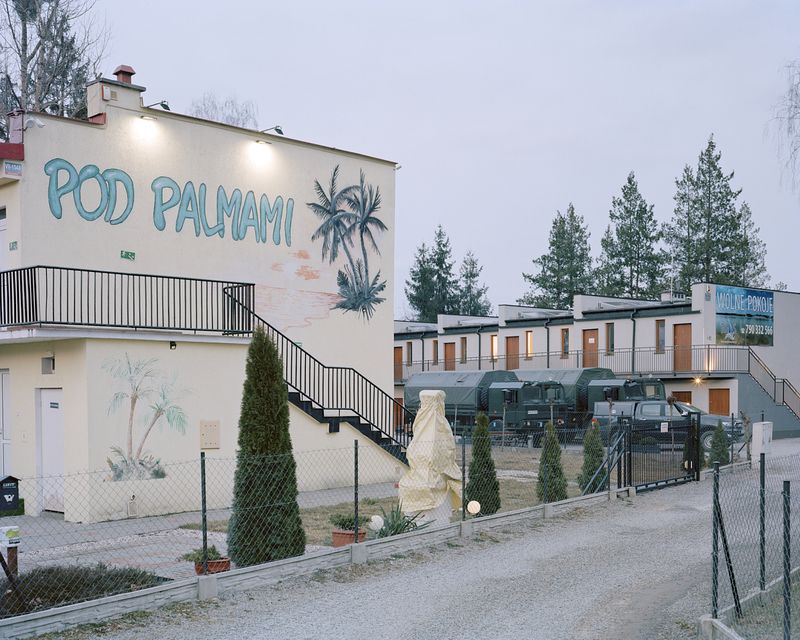 © Ludwig Nikulski - Hotel and military vehicles. Okuninka, Poland. March 2022.