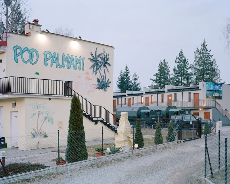 © Ludwig Nikulski - Hotel and military vehicles. Okuninka, Poland. March 2022.