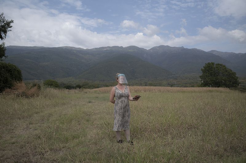 © dimitris rapakousis - A woman who operates a canteen serving food on the border separating Greece from Bulgaria.