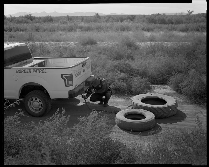 © Lisa Elmaleh - Border Patrol dragging tires to search for footprints, West Texas