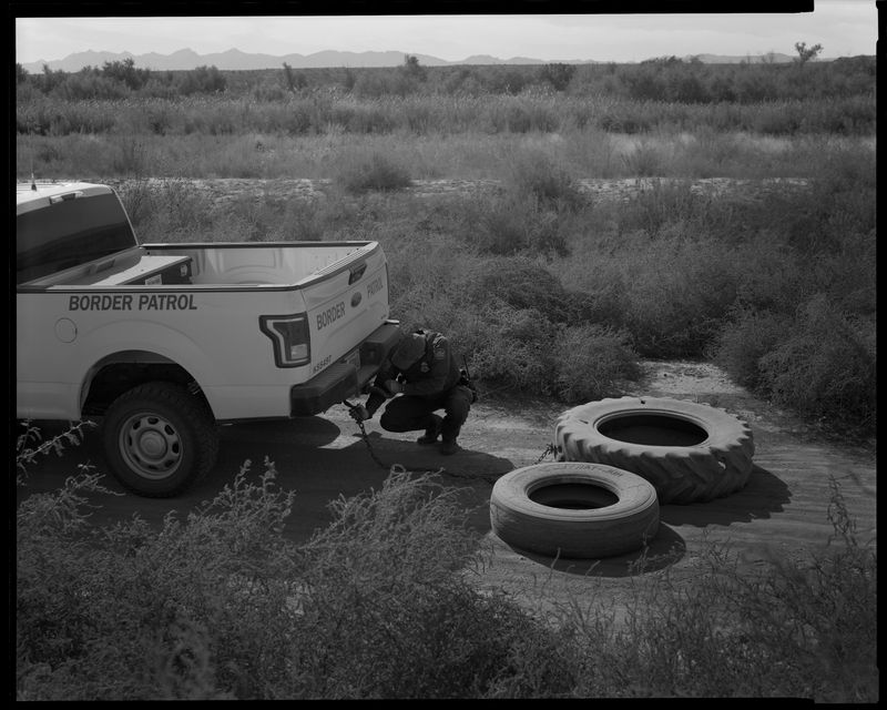 © Lisa Elmaleh - Border Patrol dragging tires to search for footprints, West Texas